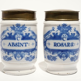 A pair of Dutch Delft blue and white albarello pharmacy jars with brass covers, 18th C.